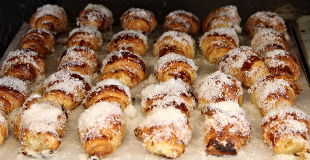 istock Mini croissant topped with cheese and sprinkled with coconut sugar 1497444273