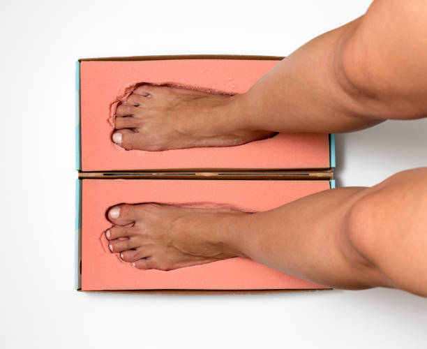 istock Orthopedic foam footprints or mold measurement from block to create custom made orthotics or orthopedic insoles 1497446856