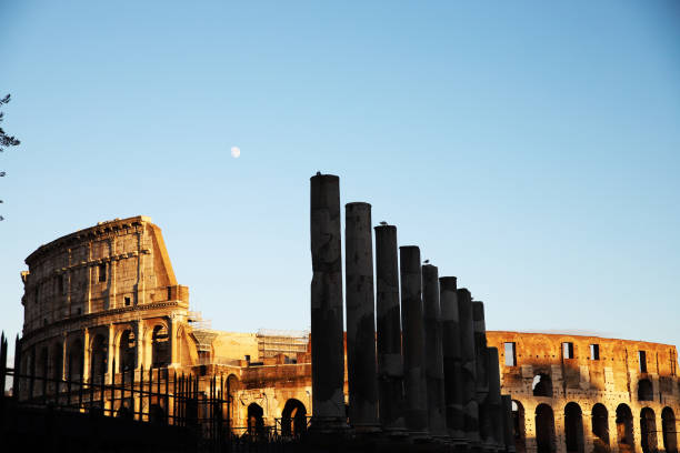 The Coliseum in Rome at sunset daylight. Copy space