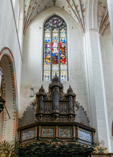 istock Ancient musical organ in a gothic church 1497448861