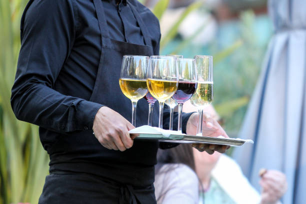 istock A Waiter serves glasses of Wine 1497452381