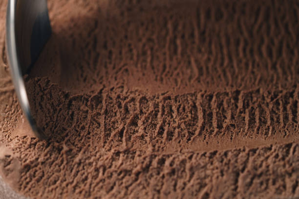 istock closeup scooping chocolate ice cream with spoon 1497452415