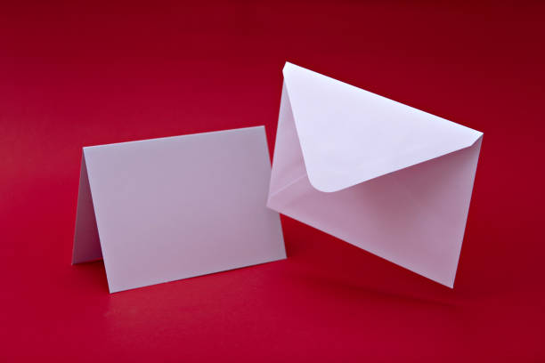 istock White envelope with blank white postcard. Mockup of love letter. Urgent message concept. Important information. 1497452896