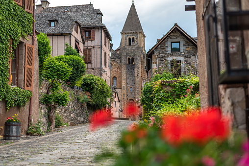 View of the village of Conques with its abbaye Saint Foy in Aveyron, France