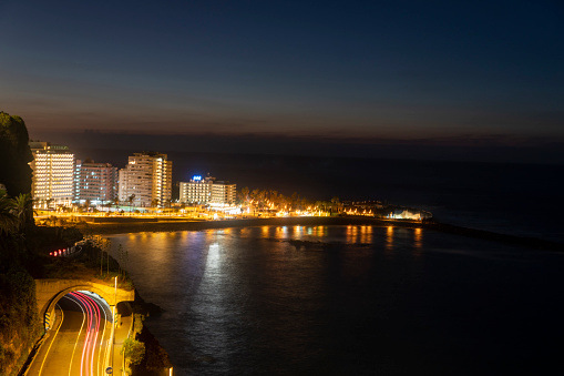 Tenerife - Puerto de la Cruz. Long exposure night scene showing the waterfront on September 23, 2021