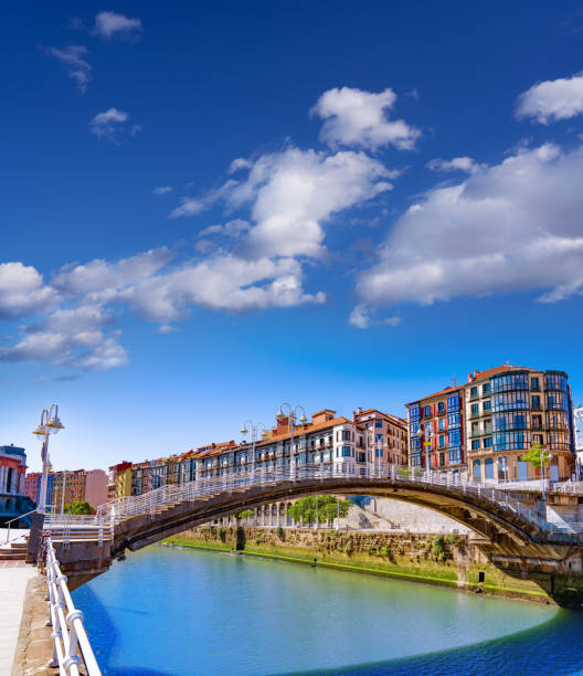 Bilbao Puente de la Ribera bridge over Nervion river and facades in Biscay Basque Country of Spain
