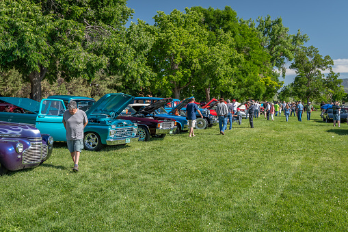 Canon City, CO, USA - June 10, 2023: Vintage cars and the peoople they attract at the 41st Annual Canon Car Club show on the grounds at the Abbey.