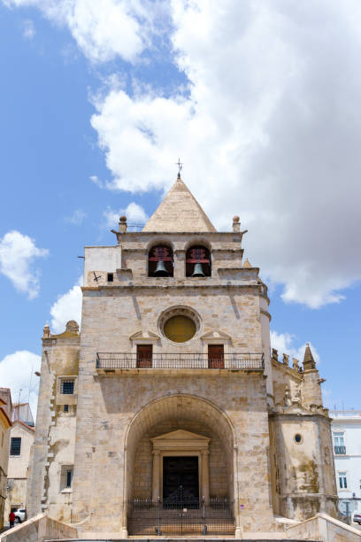istock cathedral entrance facade arch and bell tower 1497472961