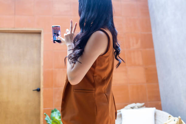 istock Pov of friend posing for a selfie 1497478092