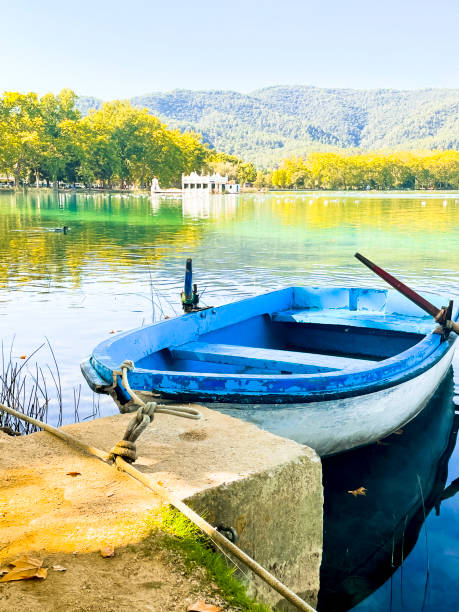 istock Small blue rowboat in the Banyoles lake, Girona, Spain 1497479513