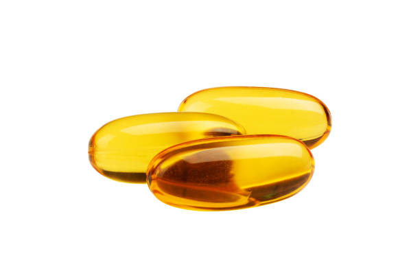 istock Fish oil capsules isolated on white background. Clipping path included. 1497481444