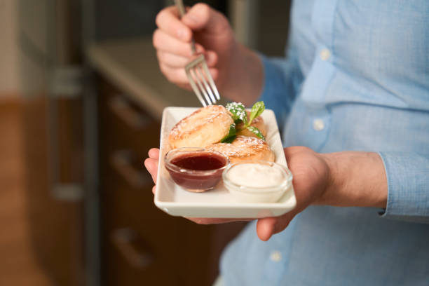 istock Close up photo of man having breakfast 1497484198