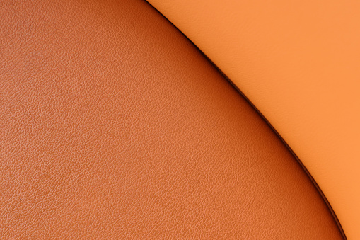 Orange leather texture background, genuine leather
