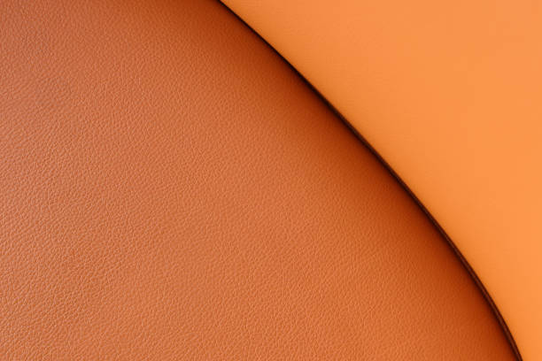 Orange leather texture background, genuine leather stock photo