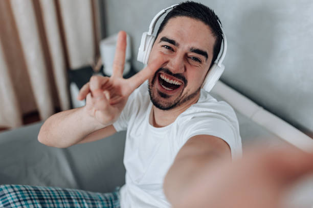 istock Man holding the peace sign 1497485672