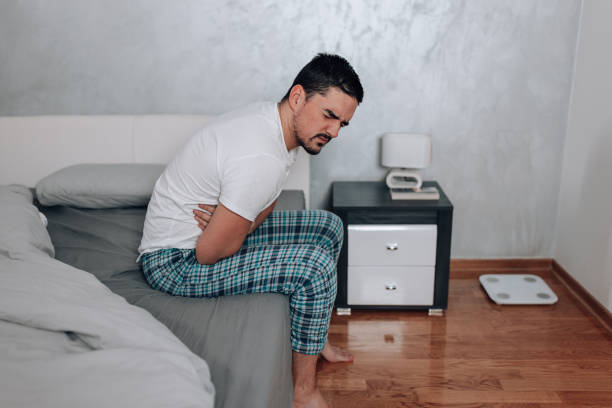 istock Man with stomach cramps 1497485689
