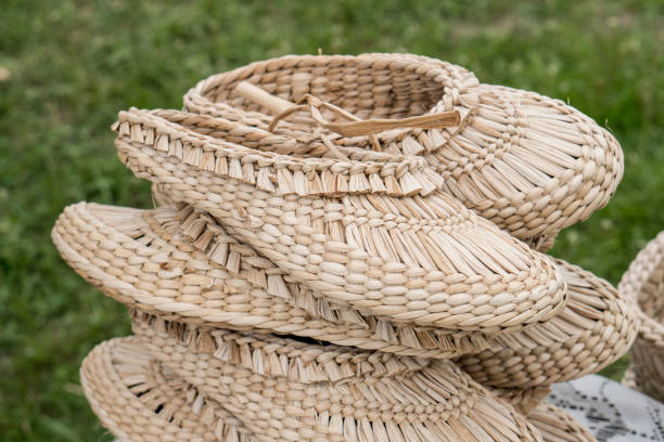 Traditional ukranian handmade woven straw slippers. Ukraininan traditional craftmenship concept