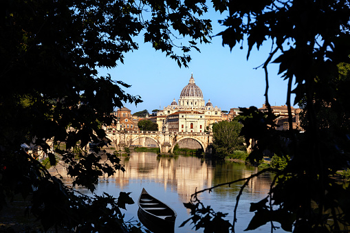 St. Peter's Basilica on Tiber River. Rome, Italy.