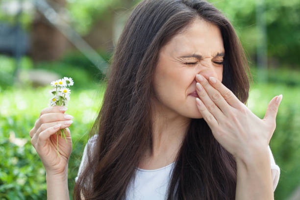 istock Young woman suffering from spring allergies 1497501846