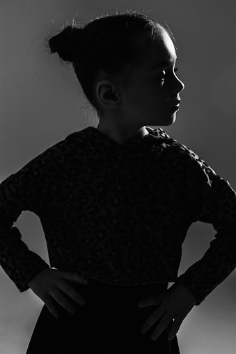 female profile on black background monochrome