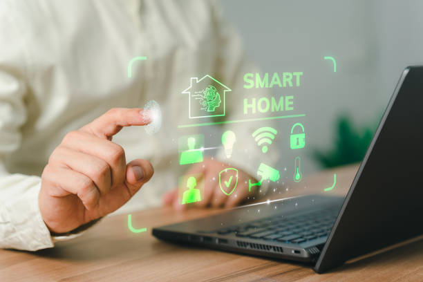 Iot or Internet of Things of smart home automation app concept. Adult man controlling technology AI smart home devices using a laptop computer with launched application in the bed room. iot o internet de las cosas del concepto de aplicación domótica inteligente. hombre adulto que controla la tecnología ai dispositivos domésticos inteligentes utilizando una computadora portátil con la aplicación iniciada en la habitación.