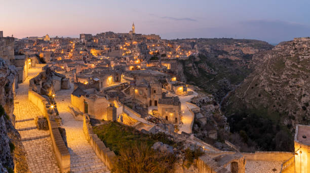 istock Matera - The cityscape at dusk. 1497510799