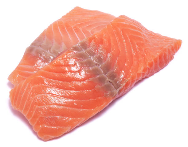 istock piece of salmon fillet isolated on white background 1497520428