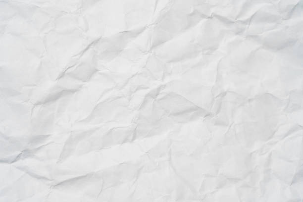 closeup of white crumpled paper for texture background. - crease imagens e fotografias de stock