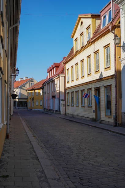 istock Empty alley amidst buildings in city during evening 1497523268