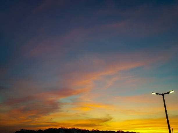 istock blue sky and colorful clouds at sunset 1497550275