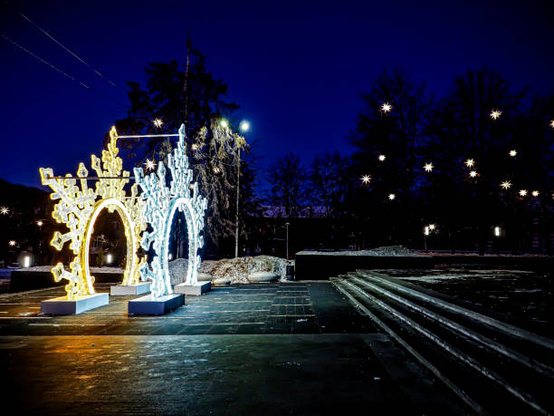istock multi-colored glowing New Year's arch in the form of snowflakes 1497551975