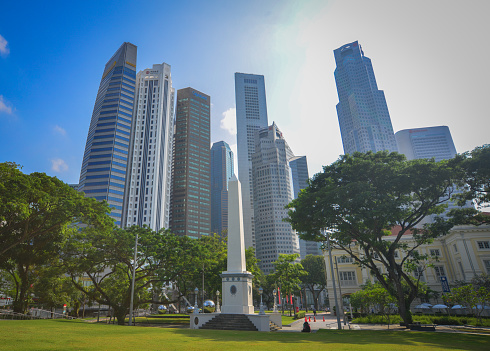 Singapore - Feb 9, 2018. Dalhousie Obelisk, a memorial obelisk with modern building background in the Civic District of Singapore.
