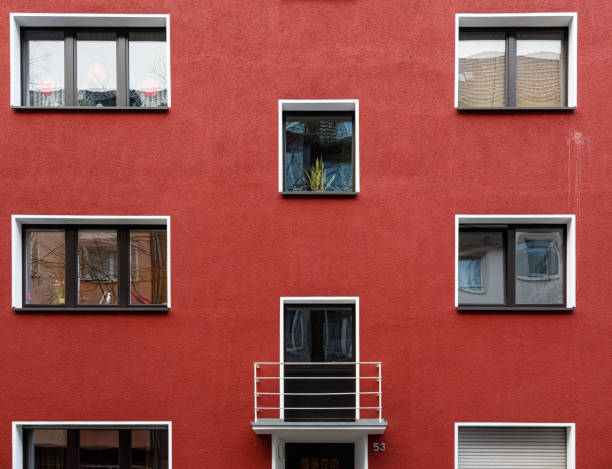 istock Facade of building with windows and balcony 1497561935