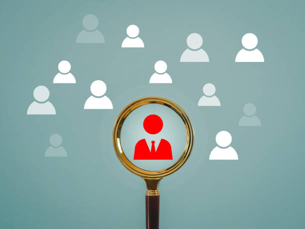 istock Human resources HR looking at a leader or team leader through a magnifying glass 1497562342