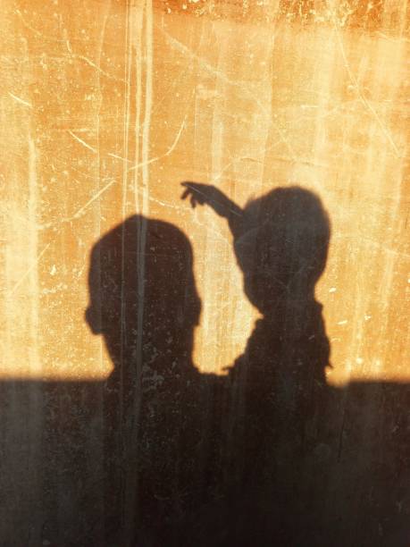 istock silhouette of father and son 1497564961