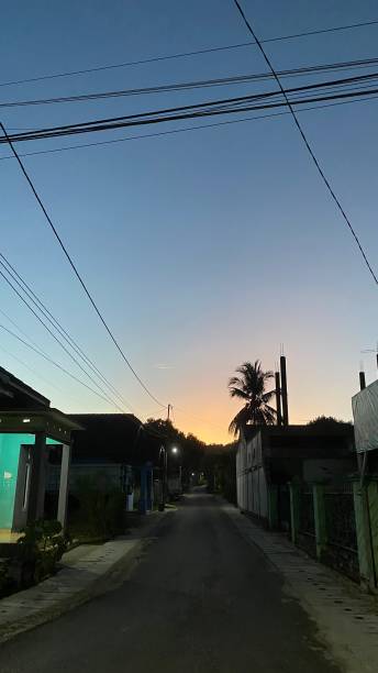 istock morning sky in front of an alley 1497569171