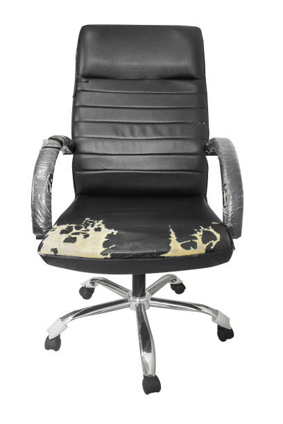 Black office chair old damage leather isolated on white background, with clipping path. Black office chair old damage leather isolated on white background, with clipping path. construction material torn run down concrete stock pictures, royalty-free photos & images