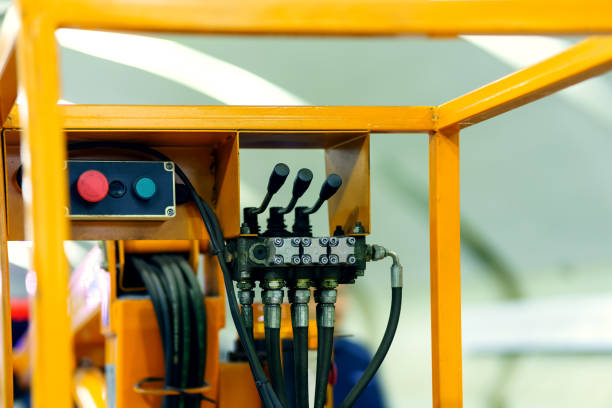 istock Levers and buttons for controlling the boom of a small crane 1497570889