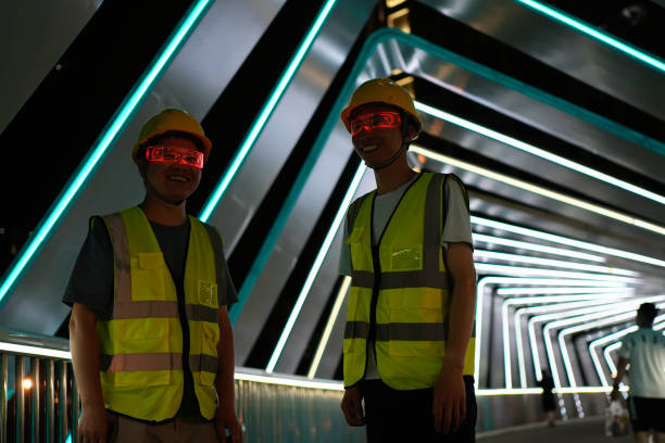 istock Two outdoor workers are experimenting with smart glasses 1497571626