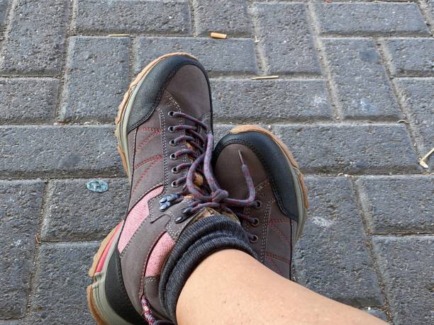 istock hiking shoes and feet 1497572601