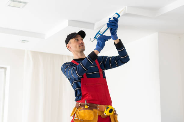 istock young construction worker. the man works on repairs 1497578249