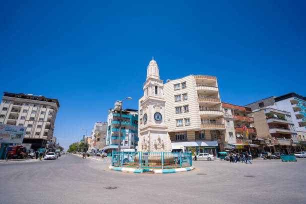 Clock tower in Akcakale district of Urfa. Sanliurfa, Turkey - June 01, 2023 Clock tower in Akcakale district of Urfa. Sanliurfa, Turkey - June 01, 2023. akçakale stock pictures, royalty-free photos & images