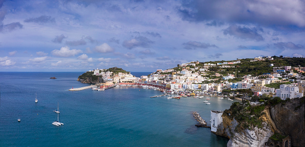 Aerial panoramic view taken by drone of the coastline of the island of Ponza located in Italy.