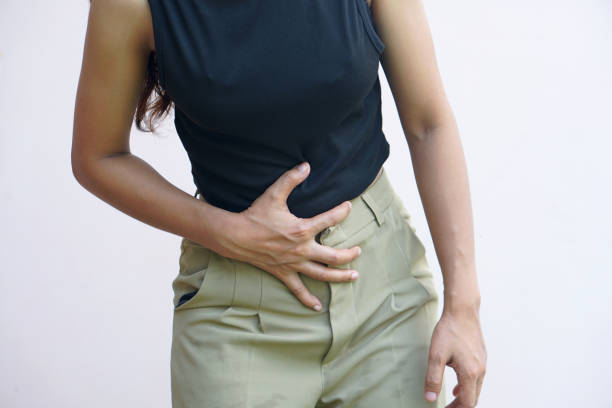 istock Woman having abdominal pain from gastritis 1497585493