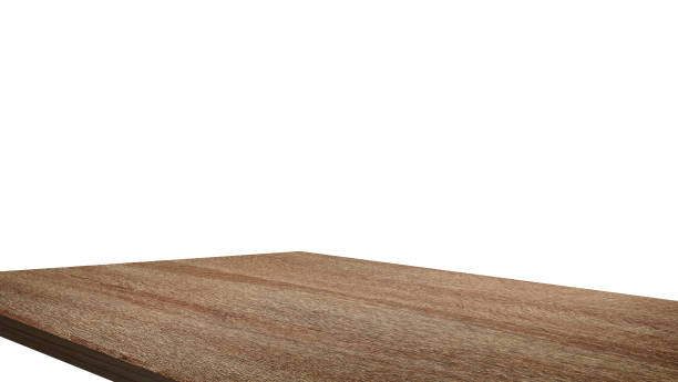 istock wooden table corner at  foreground used as product displayed isolated on background with clipping path. perspective view of wooden table showing edge of table. 1497587948