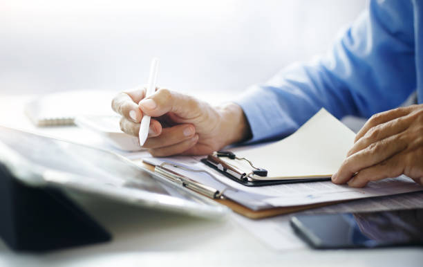 istock business person working in office 1497588497