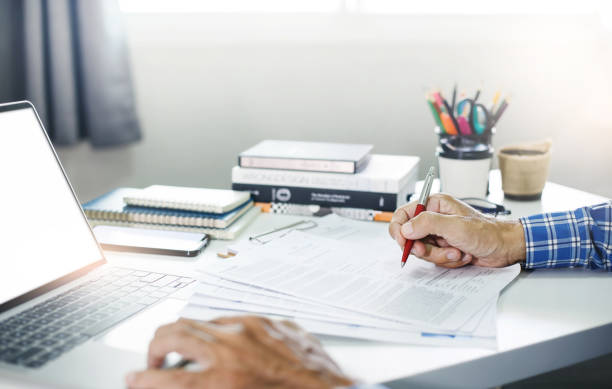 istock business person working in office 1497588571