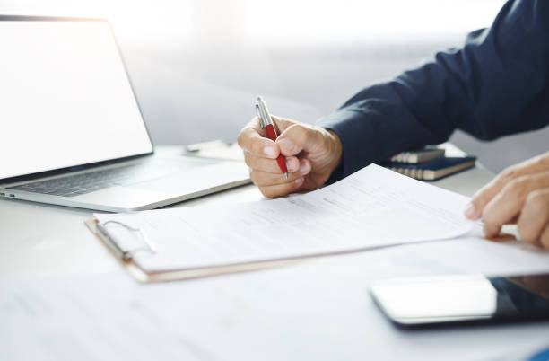 istock business person working in office 1497588596