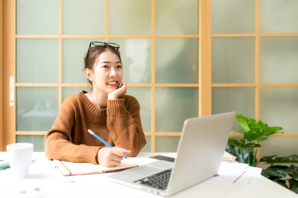 istock Young people work from home using smartphone connection for meeting with office.  Asia woman meeting conference connect online with office.  Business and Technology Concept 1497588766