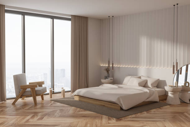 istock White master bedroom interior with armchair 1497589722